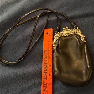 Elegant Brighton One World Black Leather  Crossbody Handbag with Silver Accents